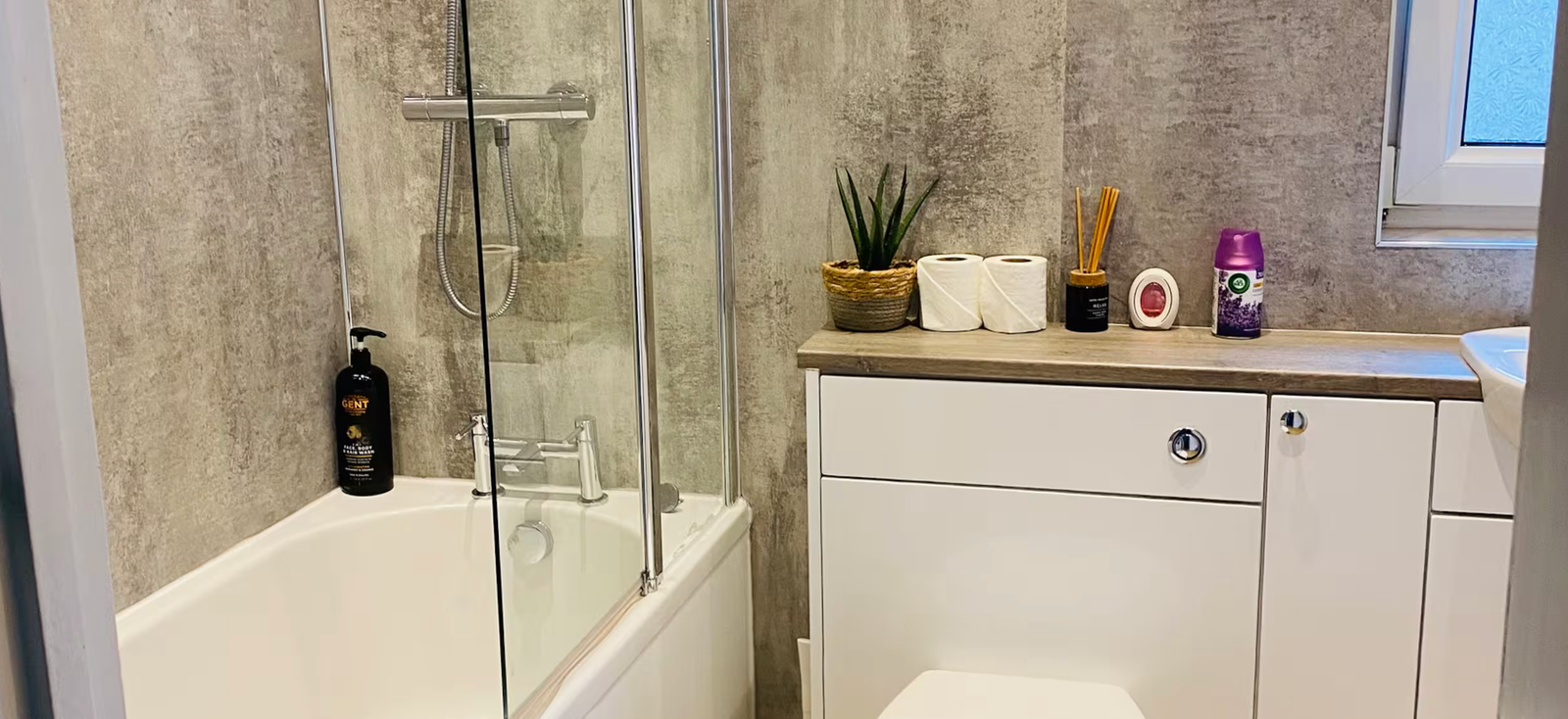 Family bathroom with bath and shower
